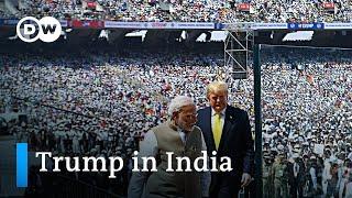 Trump starts India trip with huge stadium rally | DW News