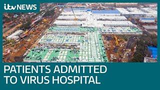 First patients admitted to new China coronavirus hospital built in 10 days | ITV News
