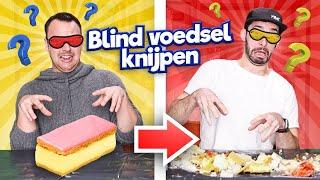 Blind in VOEDSEL knijpen!