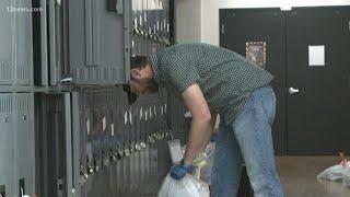 Teachers, staff help clean out lockers still holding students' belongings from before pandemic