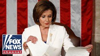 Nancy Pelosi tears up Trump's speech script behind him