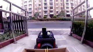 Woman uses remote control car to buy food in east China