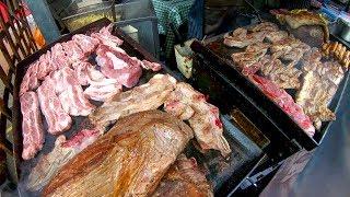 Argentina Street Food. Mountain of Beef and Sausages on Fire. London