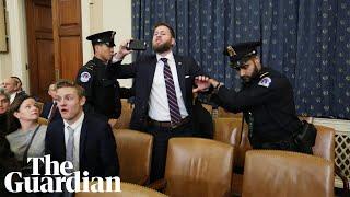 'Democrat treason': protester disrupts opening of Trump impeachment hearing