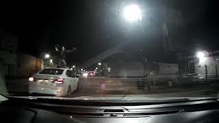 Southwest Detroit, MI, Halloween 2020, guy standing on top of car screaming on Vernor