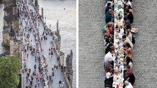 Huge dinner held on Prague bridge to celebrate easing of coronavirus restrictions in Czech Republic