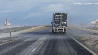 Big truck buffeted by wind on Colorado highway