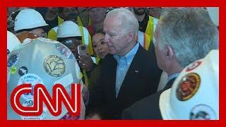 Joe Biden confronted on gun control by auto plant worker