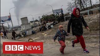 Children flee under fire as Russians advance on Kyiv - BBC News