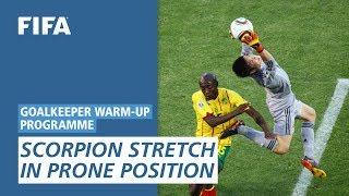 Scorpion stretch in prone position [Goalkeeper Warm-Up Programme]