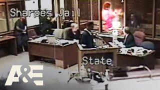 Court Cam: Fight Breaks Out In Courtroom Penalty Box between Inmates | A&E