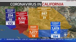 The Latest: Cases Of Coronavirus top 9,000