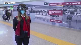 Airport staff use 'smart helmets' to scan temperatures