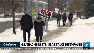 High school teachers stage 1-day strike as talks stall