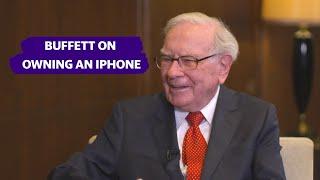 Warren Buffett on using his iPhone and having  Apple CEO Tim Cook teach him how to use it