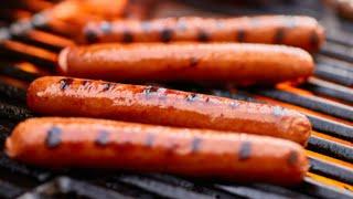 The Biggest Mistakes People Make When Grilling Hot Dogs