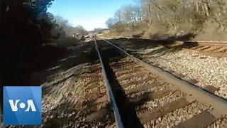 Moment US Officer Hit By Train Captured on Body Camera