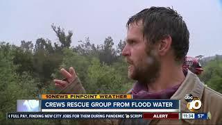 Crews rescue group from flood water