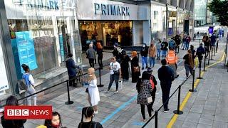 Queues and distancing as shoppers return to England’s high streets  - BBC News