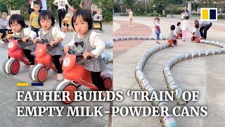 Father in China builds ‘train’ of empty milk-powder cans