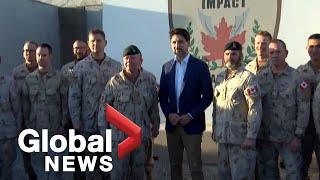 Trudeau visits troops in Kuwait while pipeline protests mount in Canada