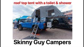 skinny guy campers : roof top tent with a shower and toilet and it fits in your garage!!!!