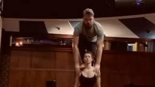 Guy Balances On Top Of Girl While Performing Tricks - 1163519