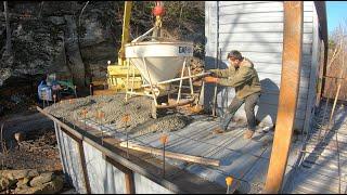 Pouring concrete on the container castle