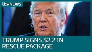 Covid-19: US President Donald Trump signs unprecedented $2.2 trillion rescue package | ITV News