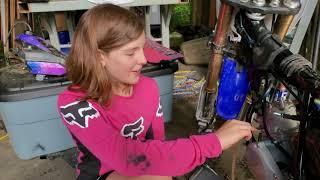 10 year old girl changes her first YZ65 top end.