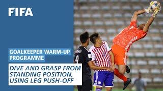 Dive and grasp from standing position, using leg push-off  [Goalkeeper Warm-Up Programme]