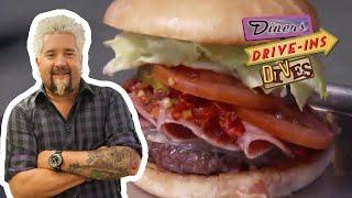 Guy Fieri Eats a Cold Cut-Topped BURGER | Diners, Drive-Ins and Dives | Food Network