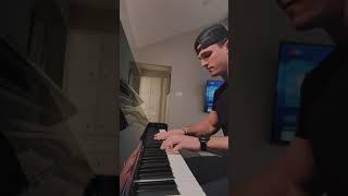 Guy plays his girlfriend's favorite song on the piano to see her reaction.