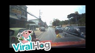 Mother Dives into Traffic to Save Child || ViralHog