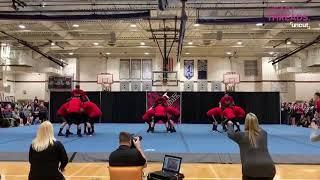 Dads perform cheerleading routine to support daughters